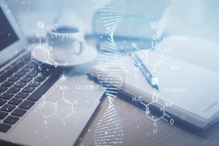 Photo for Double exposure of DNA drawing and desktop with coffee and items on table background. Concept of medical science education - Royalty Free Image