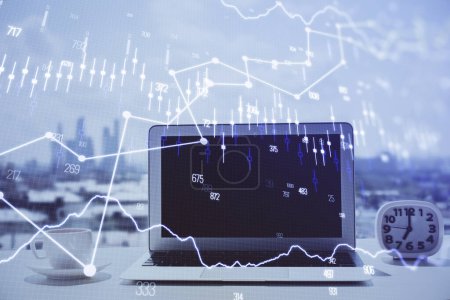 Photo for Forex Chart hologram on table with computer background. Double exposure. Concept of financial markets. - Royalty Free Image