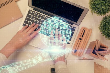 Photo for Double exposure of woman hands working on computer and blockchain theme hologram drawing. Top View. bitcoin cryptocurrency concept. - Royalty Free Image