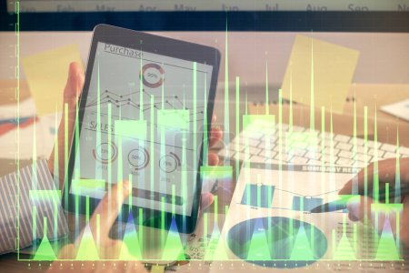 Photo for Multi exposure of man's hands holding and using a phone and financial chart drawing. Market analysis concept. - Royalty Free Image