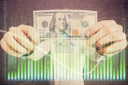 Photo for Multi exposure of forex graph drawing hologram and USA dollars bills and man hands. Technical Analysis concept. - Royalty Free Image