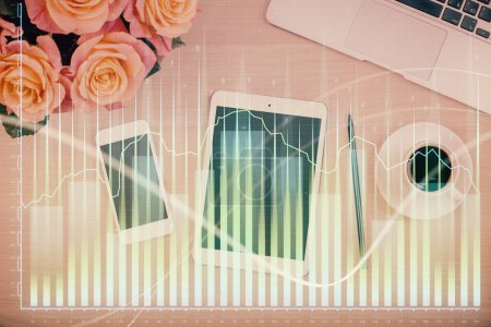 Photo for Double exposure of forex graph hologram over desktop with phone. Top view. Mobile trade platform concept. - Royalty Free Image