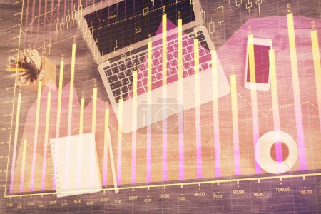Photo for Double exposure of forex chart drawing over table background with computer. Concept of financial research and analysis. Top view. - Royalty Free Image
