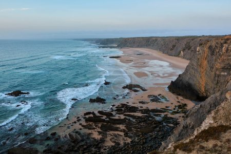 Photo for Sweeping coastline on the western Portuguese shore. Aljezur region, Portugal - Royalty Free Image
