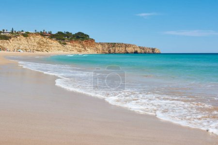 Praia do Porto de Mos in Lagos. Typical Algarvian beach with turquoise water and white sand