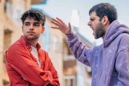Photo for Young people arguing in the street - Royalty Free Image