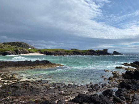 Photo for Amazing Clachtoll Beach in Lochinver, Scotland. Clachtoll Beach is a popular beach with some rugged terrain, including the Split Rocks - Royalty Free Image