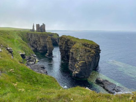 Ruins of Castle Sinclair Girnigoe, Scotland. It is located about 3 miles north of Wick on the east coast of Caithness, Scotland. It is considered to be one of the earliest seats of Clan Sinclair.