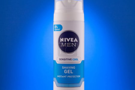 Photo for Prague,Czech Republic - 12 January 2023:Container of Nivea Men Sensitive Cool Shaving Gel on blue background - Royalty Free Image