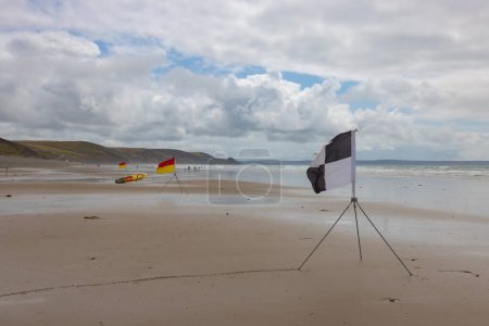 Photo for Lifeguard surfboard on the Newgale Beach suitable for kitesurfing - Royalty Free Image