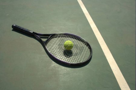 Photo for Tennis Racket and Ball in court - Royalty Free Image