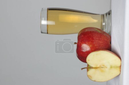 Apple juice in the glass Studio shot