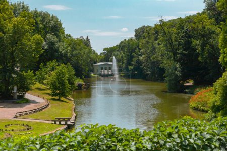 Photo for Uman, Ukraine - June 24, 2023: Sofiyivka National Dendrological Park in summer. View of the fountain and arch - Royalty Free Image