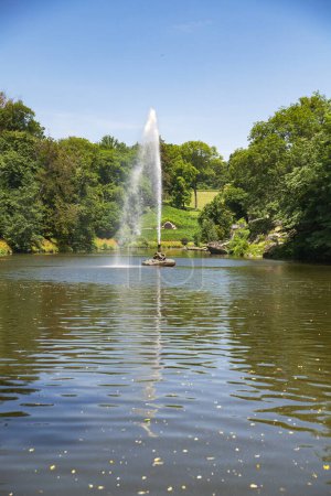 Photo for Uman, Ukraine - June 24, 2023: Fountain "Snake" in the Sofievka arboretum in summer, Uman. Vertical photography - Royalty Free Image