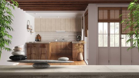 Foto de Mesa vintage de madera o estante con equilibrio de piedra, sobre cocina japandi con comedor, feng shui, diseño de interiores de arquitectura de concepto zen - Imagen libre de derechos