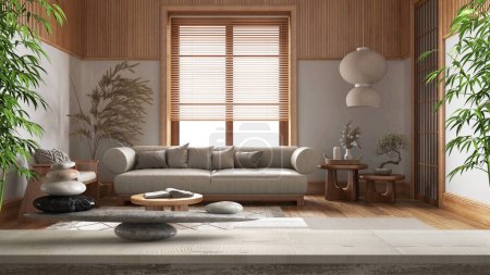 Foto de Mesa o estante vintage de madera con equilibrio de piedra y ramas de bambú, sala de estar de Japón con sofá, feng shui, diseño interior de arquitectura de concepto zen - Imagen libre de derechos