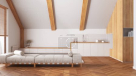 Foto de Fondo borroso, cocina de madera mínima y sala de estar con techo inclinado. Sofá y armarios de tela. Japonés estilo escandinavo, ático de diseño de interiores - Imagen libre de derechos