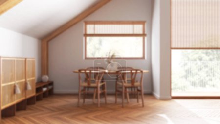 Foto de Fondo borroso, comedor de madera minimalista con techo inclinado y ventana. Mesa y sillas clásicas. Japonés estilo escandinavo, ático de diseño de interiores - Imagen libre de derechos