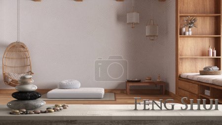 Photo for Wooden vintage table shelf with pebble balance and 3d letters making the word feng shui over minimal meditation room in japanese style, zen concept interior design - Royalty Free Image