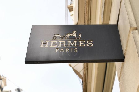 Photo for Lausanne, Switzerland - August 24 ,2022 : Signboard at the luxury store Hermess with logo - Royalty Free Image