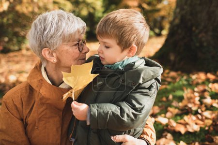 Photo for A french gray-haired grandmother with her grandson - Royalty Free Image
