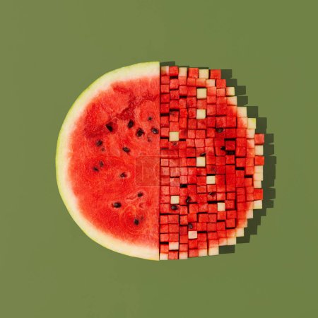 Photo for Top view of a fresh watermelon, half of which is cut into small cubes on a green background. Food art - Royalty Free Image