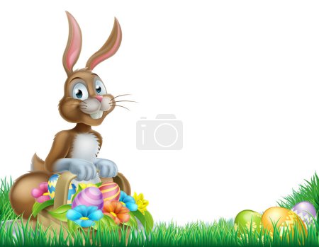 Easter bunny with a basket full of decorated chocolate Easter eggs in a field