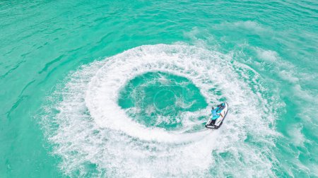 Boat drive on the sea make a cycle wave on Pattaya beach in Thailand