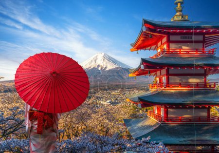 Red chureito pagoda with cherry blossom and Fujiyama mountain on the day and morning sunrise time in Tokyo city, Japan-stock-photo