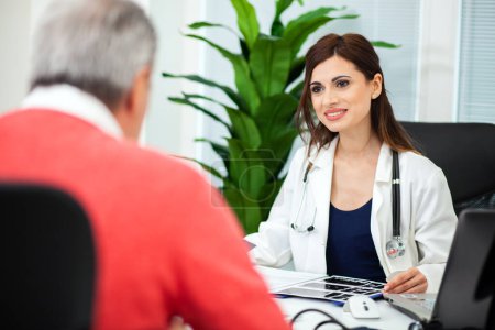 Photo for Female doctor talking to her patient - Royalty Free Image