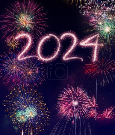 Photo for Vibrant fireworks explode forming 2024, signaling celebration for the new year - Royalty Free Image