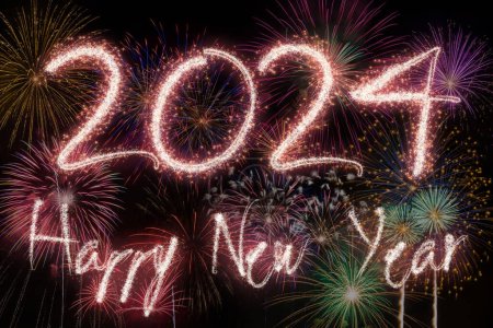 Photo for Vibrant fireworks celebrating the new year 2024 in the night sky. - Royalty Free Image