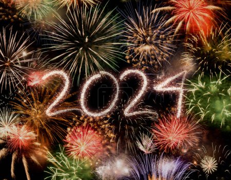 Photo for Stunning 2024 sparkler writing amidst vibrant fireworks explosion, symbolizing celebration and festivity - Royalty Free Image