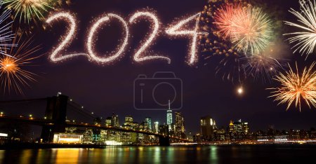 Photo for Spectacular fireworks spelling out 2024 above a cityscape at night - Royalty Free Image