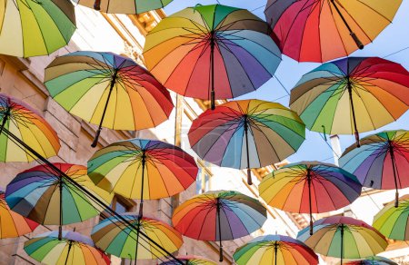 Téléchargez les photos : A picture of the colorful umbrellas at the Umbrellas Street, in Bucharest. - en image libre de droit