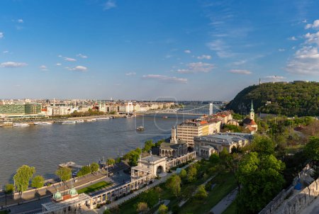 Photo for A picture of many Budapest landmarks, such as the Elisabeth Bridge, the St. Catherine of Alexandria Church, the Liberty Statue and the Varkert Bazar complex. - Royalty Free Image