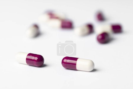 Photo for Drug prescription for treatment medication. Pharmaceutical medicament,  Pharmacy theme, Heap of red white medicament - Royalty Free Image