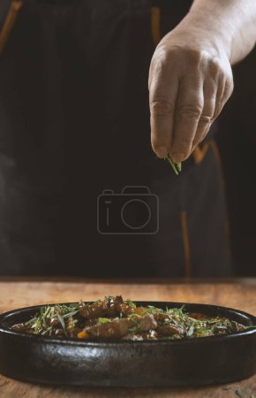 Photo for The chef prepares meat, vegetable and onion, sliced oriental or asian food - Royalty Free Image