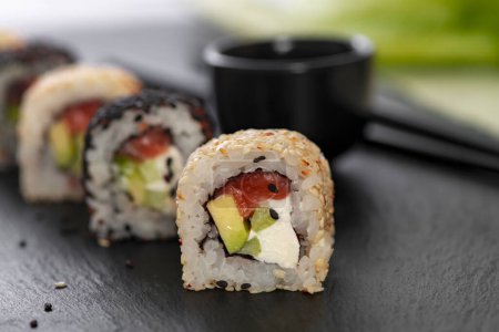 Foto de Sushi roll with rice. Sushi menu. Japanese food. - Imagen libre de derechos
