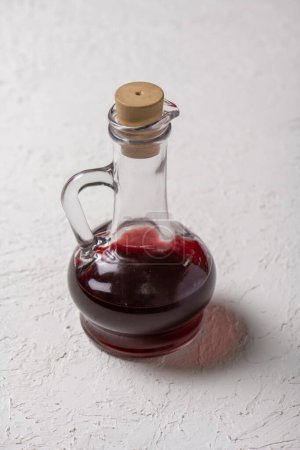Photo for Red wine in a bottle on a white background. Selective focus. - Royalty Free Image
