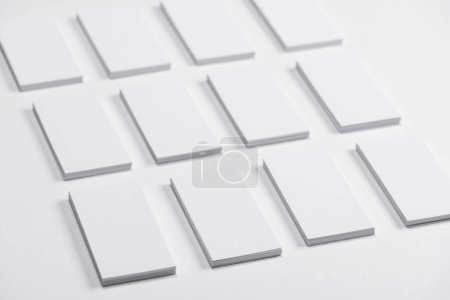 Photo for Photo of business cards. Template for branding identity. For graphic designers presentations and portfolios .Blank business cards on white background. Mockup for branding identity. - Royalty Free Image