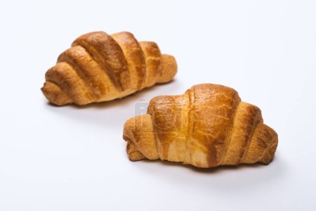 Photo for Two fresh croissants on white background - Royalty Free Image