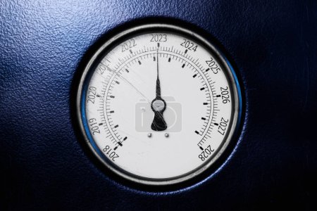 Photo for Round temperature gauge  with cutoffs 2023 and other years  isolated on a black panel. Circular barometer or indicator template. 3d illustration - Royalty Free Image