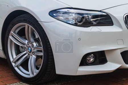 Photo for Side, Turkey -January 21, 2023:    BMW 3-series   , side of  white  car with clear light headlight, bumper,  foglights - Royalty Free Image