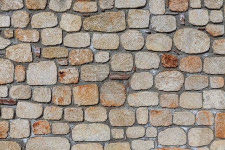 Téléchargez les photos : Close up of the walls made of stone , stone background. - en image libre de droit