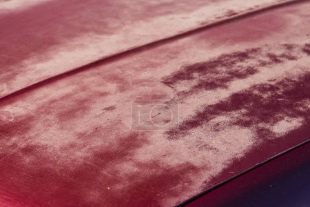Photo for Close-up of an rd old shabby car cover - Royalty Free Image