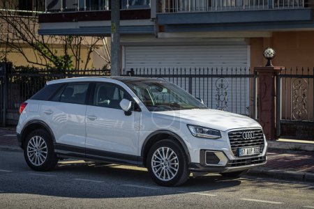 Photo for Side, Turkey -February 05, 2023:     white Audi Q2  is parked  on the street on a warm  day - Royalty Free Image