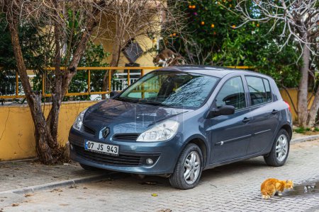 Photo for Side, Turkey  February 04 2023:    blue  Renault Clio  is parked  on the street on a warm  day - Royalty Free Image