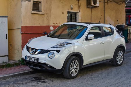 Photo for Side, Turkey - February  11, 2023:     white Nissan  Juke   is parked  on the street on a warm summer day - Royalty Free Image