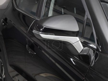 Photo for Side mirror of a  black car close-up. Exterior detail - Royalty Free Image